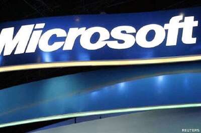 Microsoft takes $6.2 bn charge, slows Internet hopes