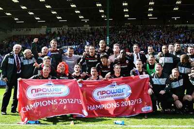 Cardiff follow EPL promotion with Championship title